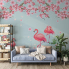 Pink flamingos beneath falling cherry blossoms with tropical plants against light gray background - view 7 - final