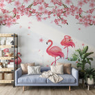 Pink flamingos beneath falling cherry blossoms with tropical plants against light gray background - final living-room
