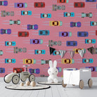 Colorful toy cars scattered on pink background creating playful repeating pattern for children - view 3 - final