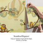 Whimsical tree mural with monkeys and hot air balloon against yellow background - view 3 - final