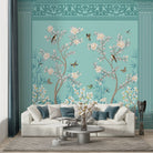 Elegant chinoiserie mural with white blossoms and birds on turquoise background with ornate borders - final living-room