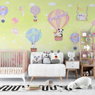 Cute cartoon animals riding pastel hot air balloons on mint green background - final kids-room